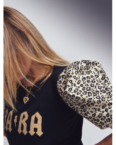 Camiseta “Rara Leopardo” · Estampado animal print · Aire Retro Camiseta “Rara Leopardo” · Estampado animal print · Aire Retro